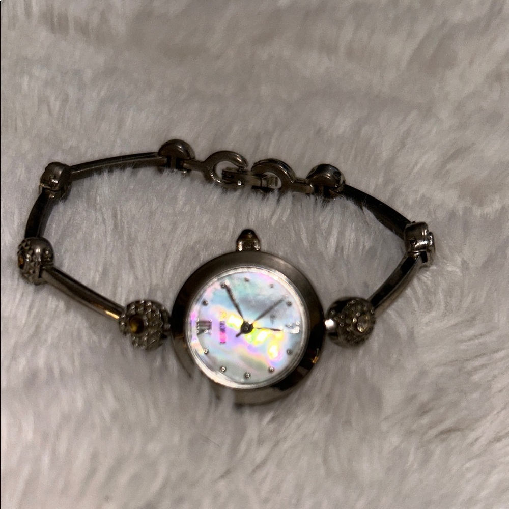 vintage Rumours quartz watch with a mother of pearl face